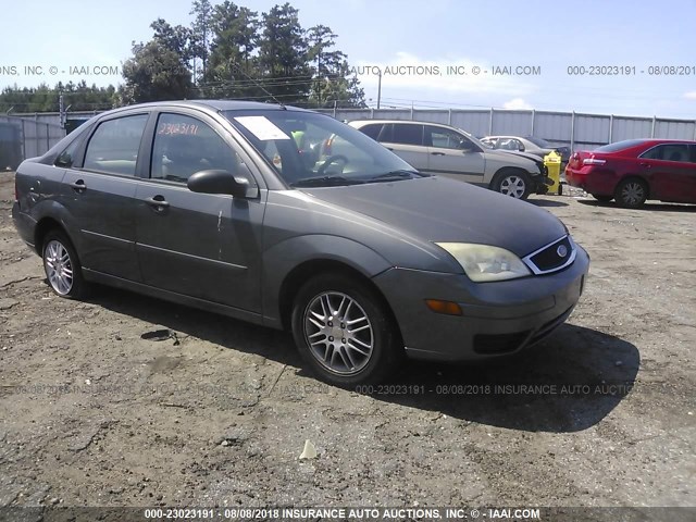 1FAFP34N86W163567 - 2006 FORD FOCUS ZX4 GRAY photo 1