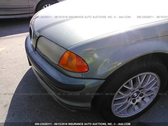 WBAAM5334XFR04112 - 1999 BMW 328 I AUTOMATIC GREEN photo 6