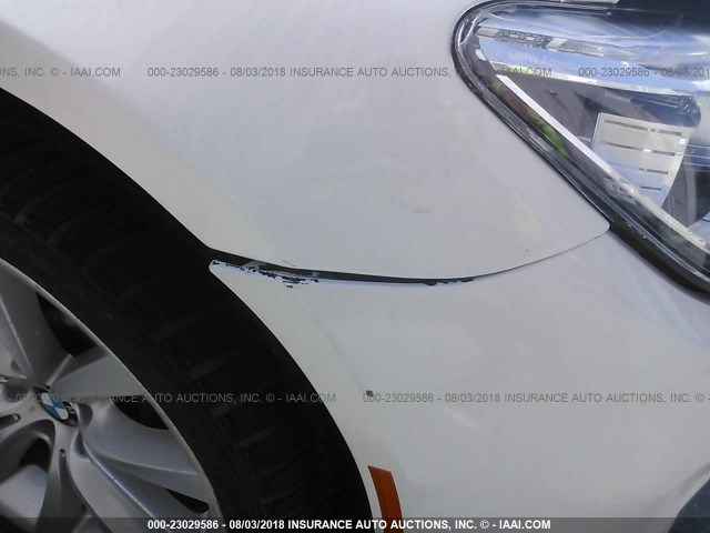 WBAYE8C59ED135260 - 2014 BMW 750 LI WHITE photo 6