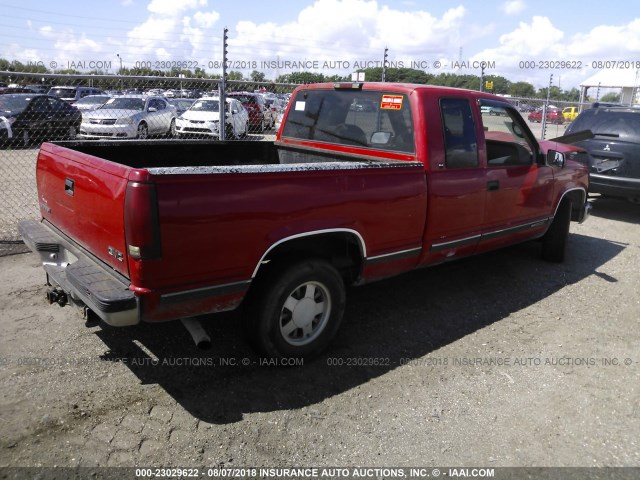 1GTEC19R5WE559432 - 1998 GMC SIERRA C1500 RED photo 4