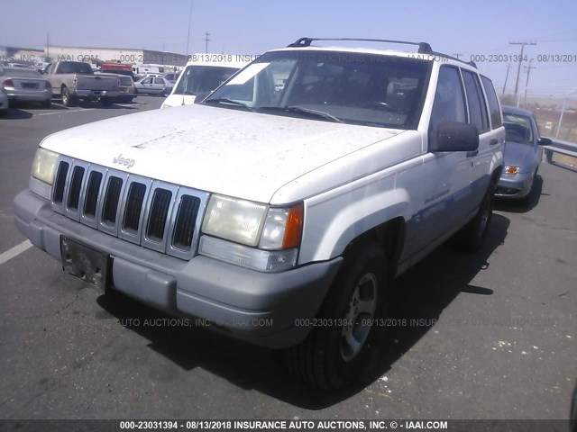 1J4GZ58S8VC690166 - 1997 JEEP GRAND CHEROKEE LAREDO/TSI WHITE photo 2