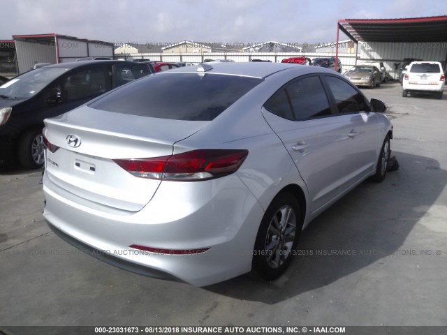 KMHD84LF4JU510178 - 2018 HYUNDAI ELANTRA SEL/VALUE/LIMITED SILVER photo 4