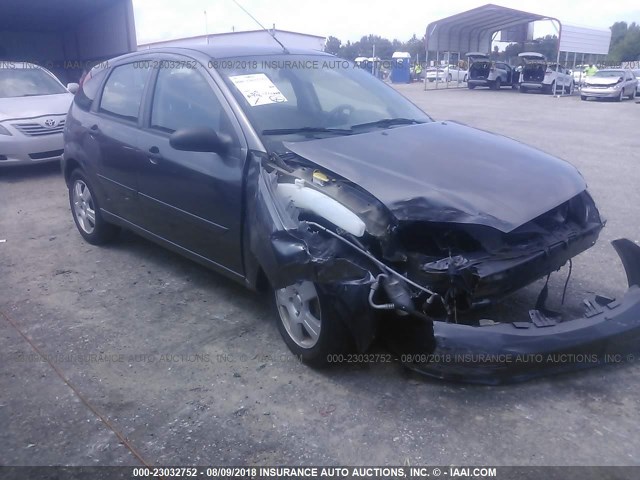 1FAFP37N47W227648 - 2007 FORD FOCUS ZX5/S/SE/SES GRAY photo 1