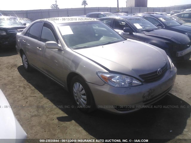 JTDBE32K440268453 - 2004 TOYOTA CAMRY LE/XLE Champagne photo 1