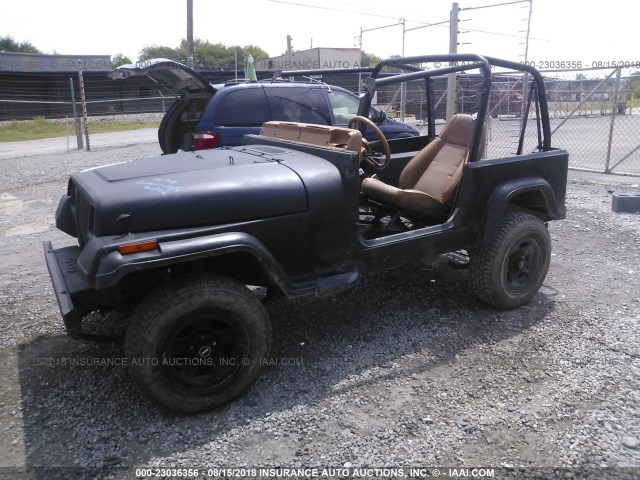 1J4FY19P7SP230602 - 1995 JEEP WRANGLER / YJ S/RIO GRANDE BLACK photo 2