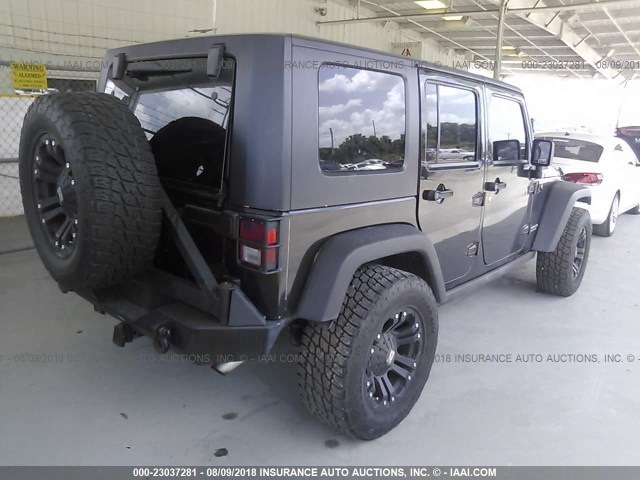 1J4GA691X9L773512 - 2009 JEEP WRANGLER UNLIMITE RUBICON BLACK photo 4