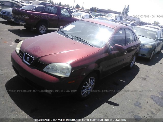 KL5JJ56ZX5K196051 - 2005 SUZUKI FORENZA LX/EX RED photo 2