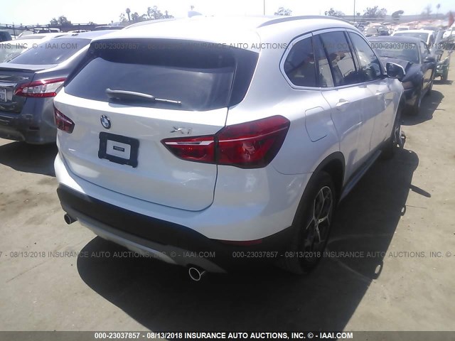 WBXHU7C31J5H39944 - 2018 BMW X1 SDRIVE28I WHITE photo 4