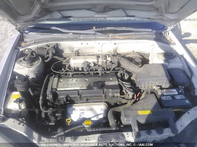 KMHCG45CX4U502995 - 2004 HYUNDAI ACCENT SILVER photo 10