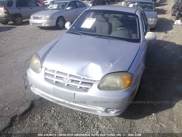 KMHCG45CX4U502995 - 2004 HYUNDAI ACCENT SILVER photo 6