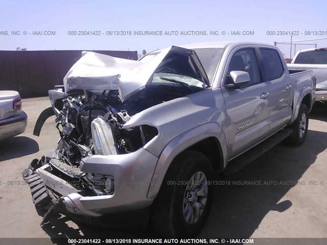 5TFAZ5CN3GX007220 - 2016 TOYOTA TACOMA DBL CAB/SR5/TRD SPORT/OR SILVER photo 2