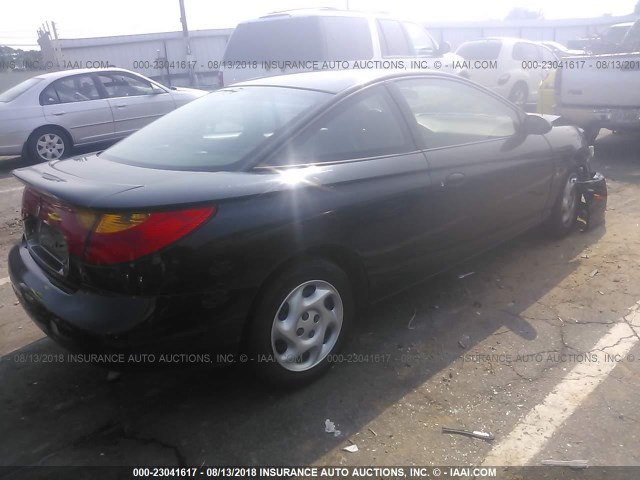 1G8ZR12751Z325828 - 2001 SATURN SC2 BLACK photo 4