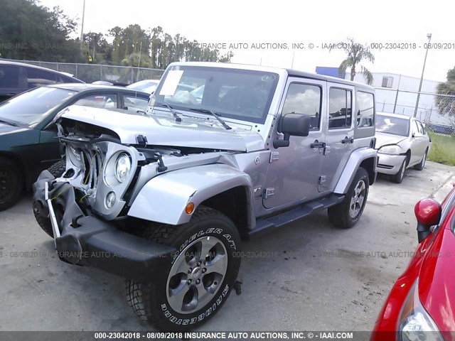 1C4HJWEG2JL922150 - 2018 JEEP WRANGLER UNLIMITE SAHARA SILVER photo 2