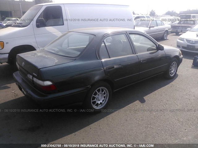 1NXBA02E3VZ632162 - 1997 TOYOTA COROLLA CE GREEN photo 4