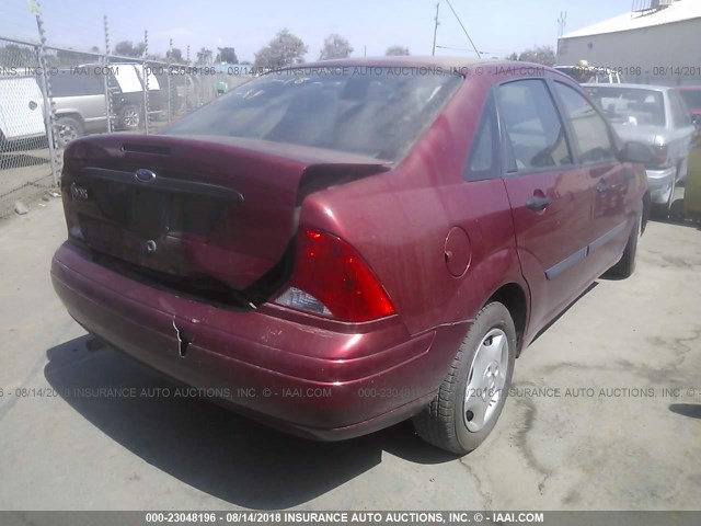 1FAFP33P23W261783 - 2003 FORD FOCUS LX RED photo 4
