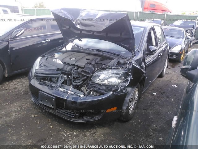 WVWDB7AJ6BW090587 - 2011 VOLKSWAGEN GOLF BLACK photo 2