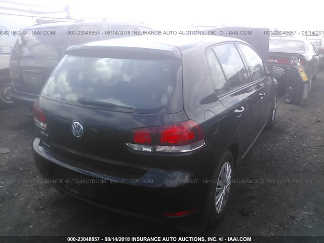 WVWDB7AJ6BW090587 - 2011 VOLKSWAGEN GOLF BLACK photo 4