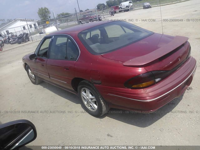 1G2HX52KXWH221212 - 1998 PONTIAC BONNEVILLE SE RED photo 3