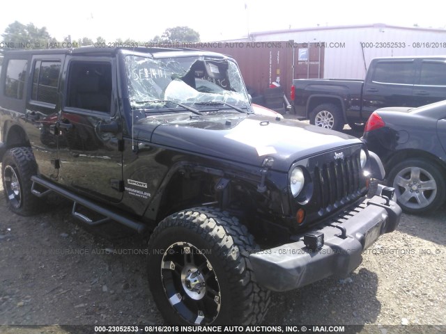 1J4BA3H19AL121995 - 2010 JEEP WRANGLER UNLIMITE SPORT BLACK photo 1