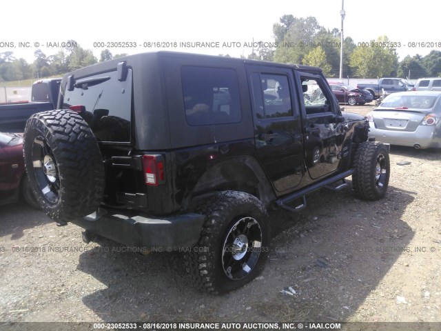 1J4BA3H19AL121995 - 2010 JEEP WRANGLER UNLIMITE SPORT BLACK photo 4