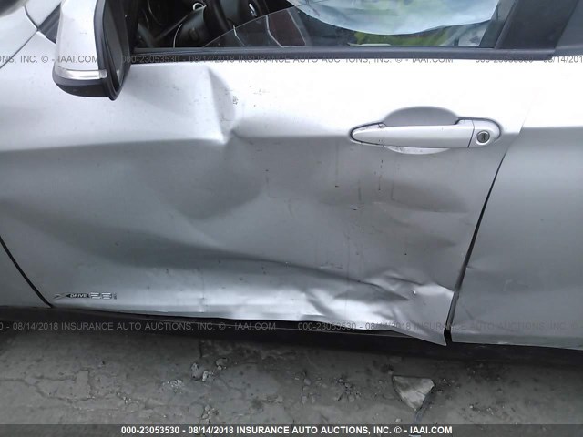 WBAVL1C5XEVY19714 - 2014 BMW X1 XDRIVE28I GRAY photo 6