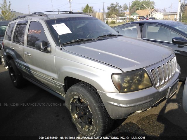 1J8GW68JX2C115969 - 2002 JEEP GRAND CHEROKEE OVERLAND SILVER photo 1