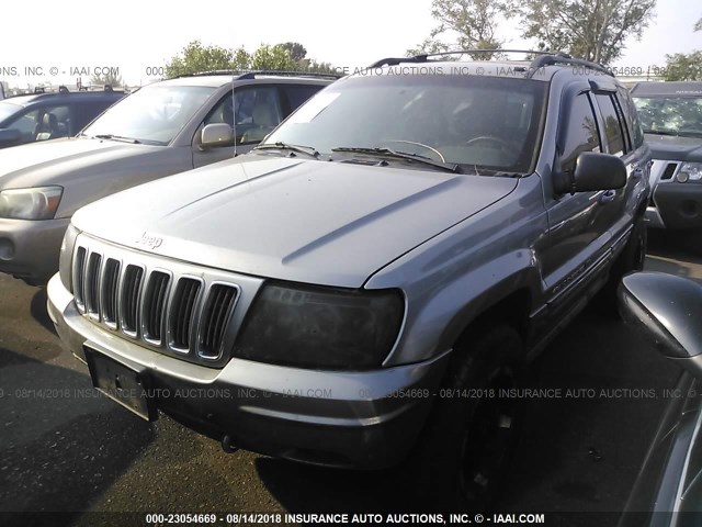 1J8GW68JX2C115969 - 2002 JEEP GRAND CHEROKEE OVERLAND SILVER photo 2