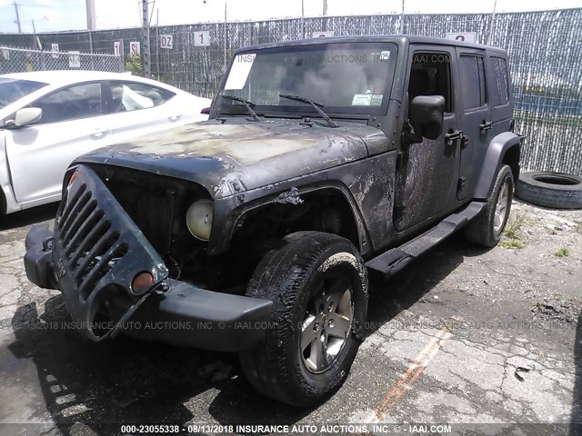 1J4BA3H17AL134213 - 2010 JEEP WRANGLER UNLIMITE SPORT GREEN photo 2