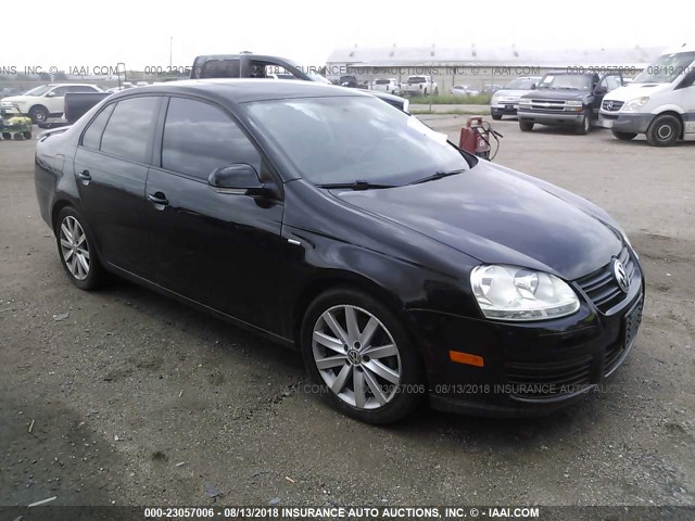 3VWRJ7AJ3AM048026 - 2010 VOLKSWAGEN JETTA WOLFSBURG BLACK photo 1