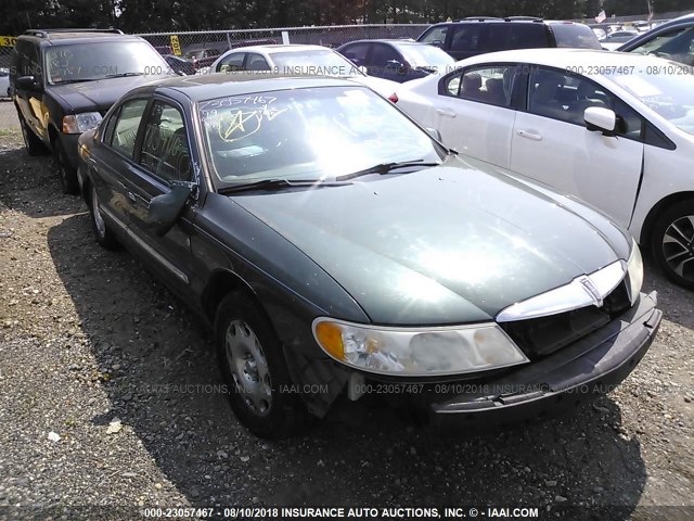 1LNHM97V0XY690160 - 1999 LINCOLN CONTINENTAL  GREEN photo 1