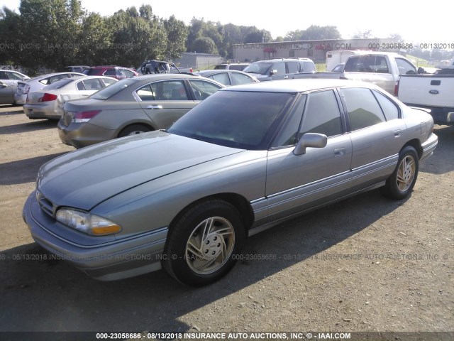 1G2HX53L6P1303309 - 1993 PONTIAC BONNEVILLE SE GRAY photo 2