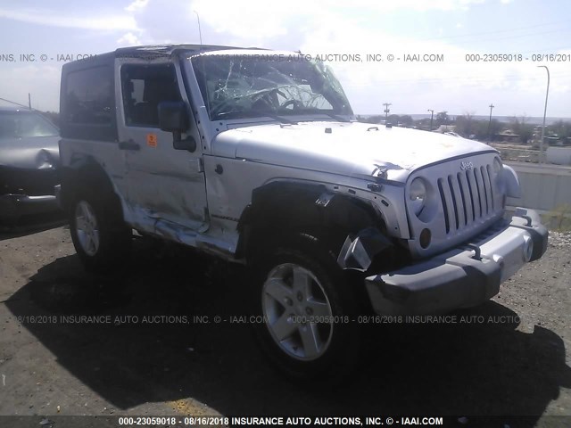 1J8FA54169L715618 - 2009 JEEP WRANGLER SAHARA SILVER photo 1