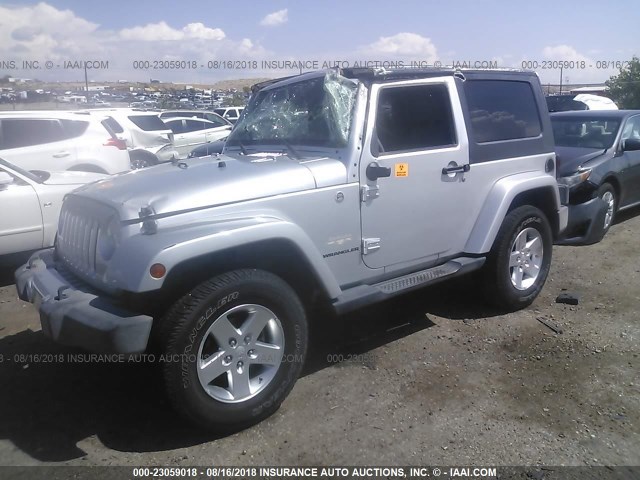 1J8FA54169L715618 - 2009 JEEP WRANGLER SAHARA SILVER photo 2