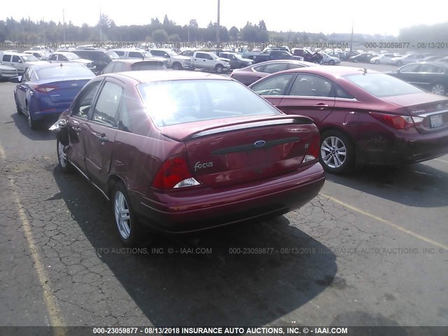 1FAFP3433YW239794 - 2000 FORD FOCUS SE/SE SPORT RED photo 3