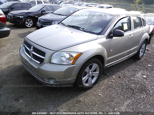 1B3CB3HA5AD598443 - 2010 DODGE CALIBER MAINSTREET GOLD photo 2