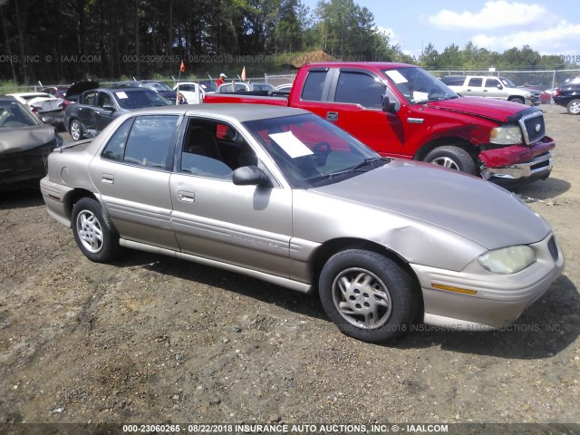 1G2NE52T2VC760744 - 1997 PONTIAC GRAND AM SE GOLD photo 1