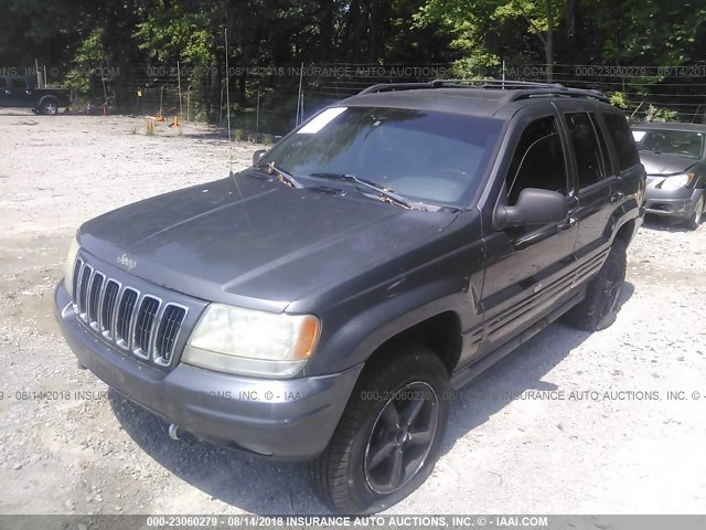 1J8GW68JX2C330428 - 2002 JEEP GRAND CHEROKEE OVERLAND GRAY photo 2