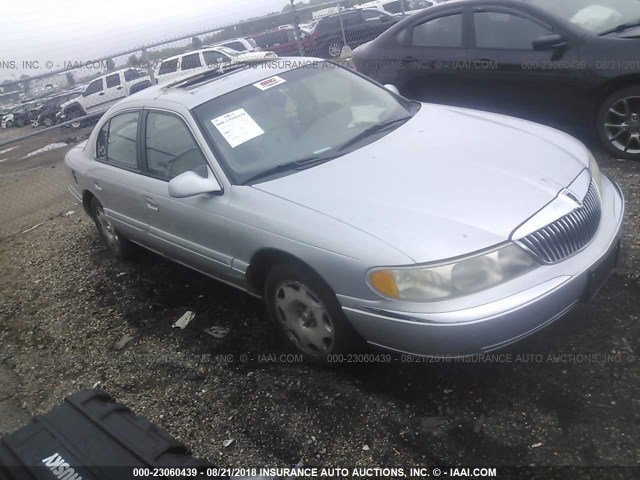 1LNHM97V7YY882144 - 2000 LINCOLN CONTINENTAL  SILVER photo 1