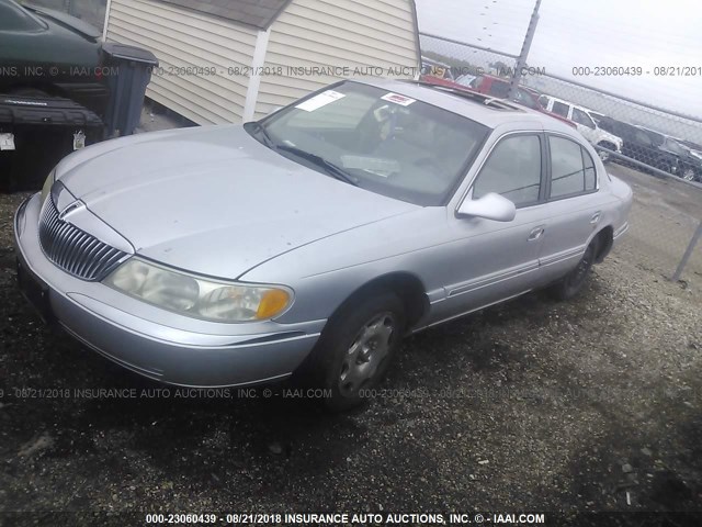 1LNHM97V7YY882144 - 2000 LINCOLN CONTINENTAL  SILVER photo 2