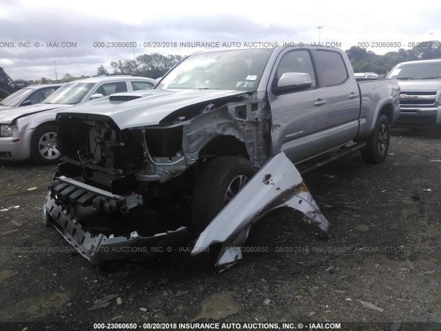 3TMDZ5BN1GM010069 - 2016 TOYOTA TACOMA DBL CAB/SR5/TRD SPORT/OR SILVER photo 2