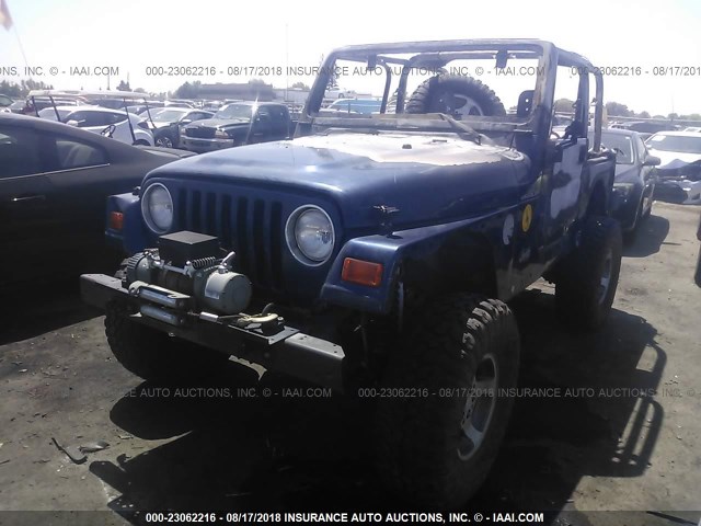 1J4FA49S62P761591 - 2002 JEEP WRANGLER / TJ SPORT BLUE photo 2