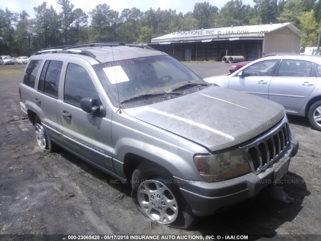 1J4GX48S21C504616 - 2001 JEEP GRAND CHEROKEE LAREDO GRAY photo 1