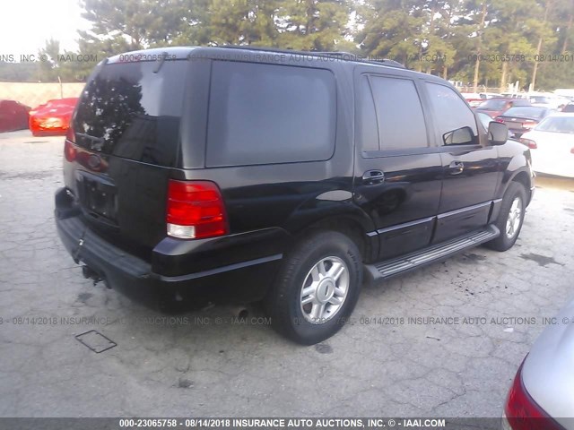 1FMPU16W83LC04242 - 2003 FORD EXPEDITION XLT BLACK photo 4