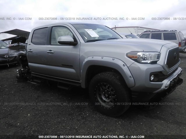 5TFCZ5AN2HX117379 - 2017 TOYOTA TACOMA DBL CAB/SR/TRDSPT/OR/PRO SILVER photo 1