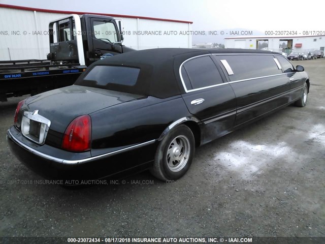 1L1FM81W5XY650130 - 1999 LINCOLN TOWN CAR EXECUTIVE BLACK photo 4