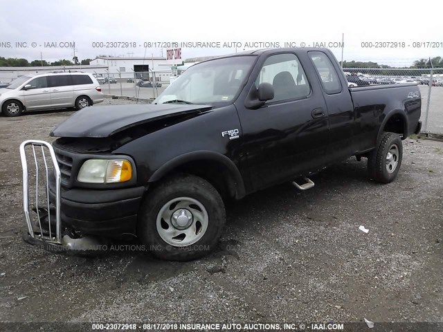 1FTRX18W23NB76993 - 2003 FORD F150 Черный фото 2