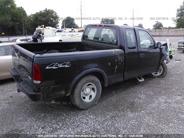 1FTRX18W23NB76993 - 2003 FORD F150 Черный фото 4