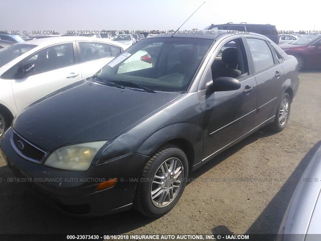 1FAFP34N96W189711 - 2006 FORD FOCUS ZX4 GRAY photo 2
