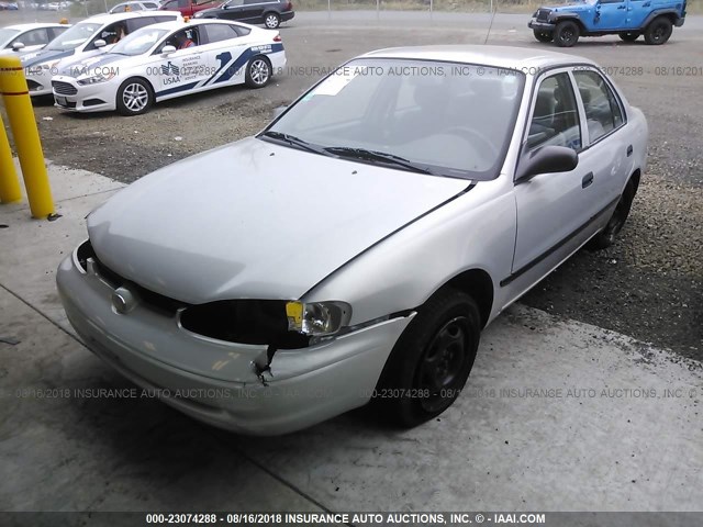 1Y1SK528XXZ438660 - 1999 CHEVROLET GEO PRIZM LSI SILVER photo 6