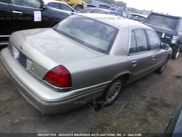 2FAFP74W5YX155241 - 2000 FORD CROWN VICTORIA LX GOLD photo 4
